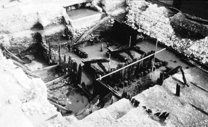 Trig Lane medieval waterfront development, from left to right: 13th century revetment, mid 14th century, late 14th century then 15th century river wall