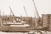 WORKING WATERFRONT, 1937:  This busy wharf and warehouse owned by Wm Muller & Co stood on the Custom House site where Geoffrey Chaucer worked in 14th century (MoL PLA Collection)
