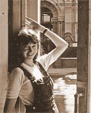 The much missed Caroline Rochester, who served as finds assistant for the project from 1981-83, at the doorway of Joe’s Café, opposite St Magnus the Martyr church Photo: Paul Tyers