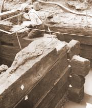 Recording the SW corner of timber quay with bridge pier to the south. Photo: J Bailey Museum of London