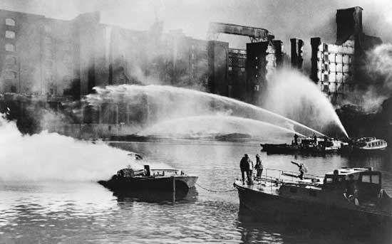 Fighting fires in warehouses containing assorted toxic combustibles Mary Evans Picture Library