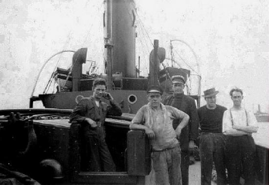 June 1940: Job Done. Tugboat crew, just back from Dunkirk Unknown photographer