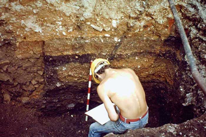 Andy Plint recording a section through a series of metalled gravel surfaces of a Roman road – defined in the north-east corner of the site during the watching brief.