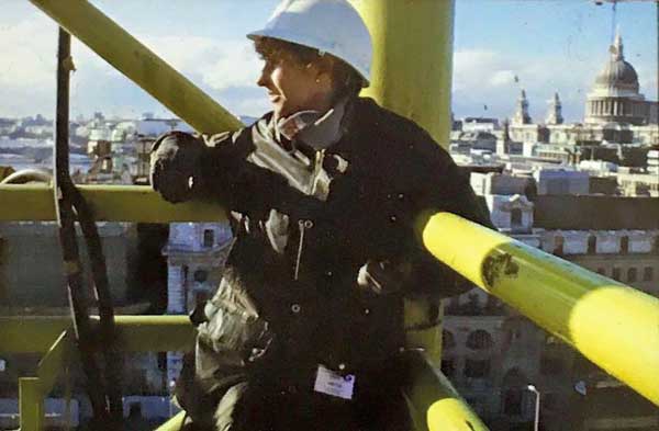 Chrissie Milne up a 100 ft crane on site.