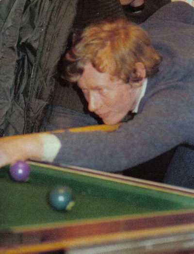 Mike playing pool