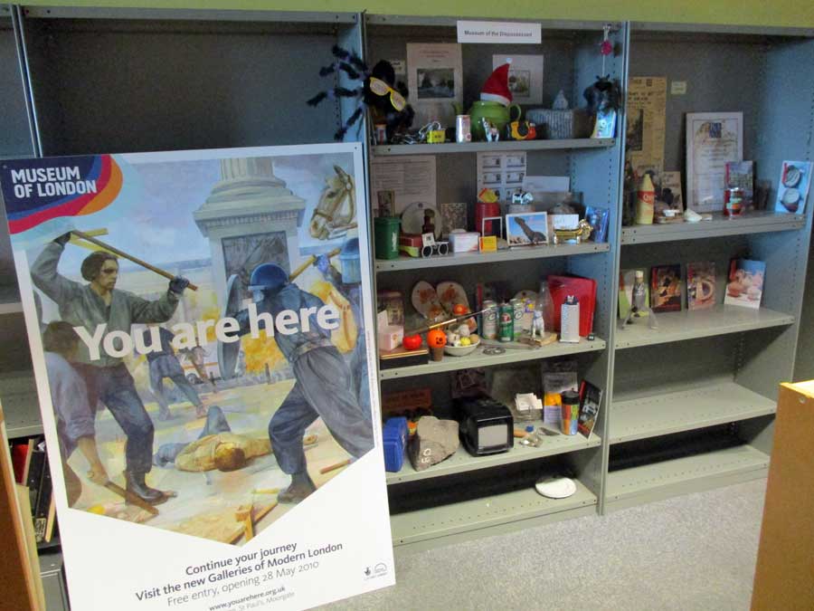Photograph of shelves with momentos through the years displayed