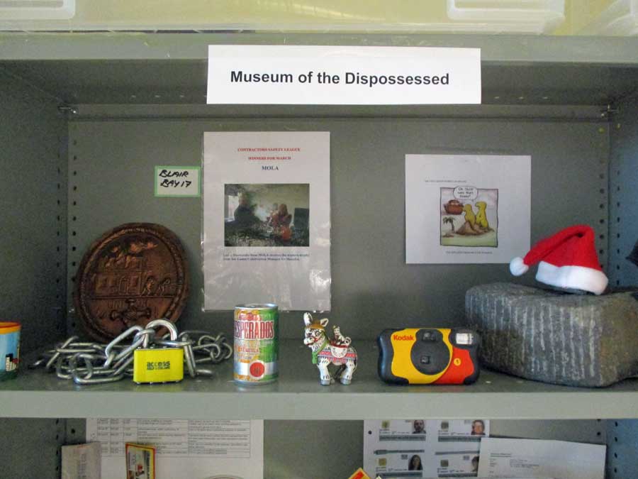 Photograph of shelves with momentos through the years displayed