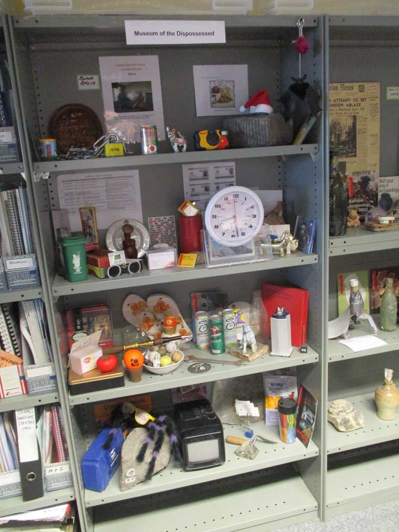 Photograph of shelves with momentos through the years displayed