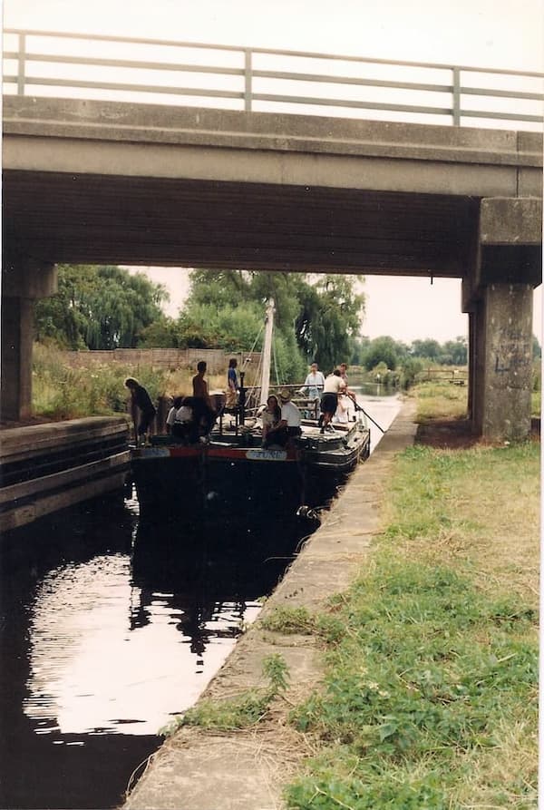 Gus and Damian Goodburn punt the boat through a bridge which turns out to be too low for the mast top. The owner is not amused!
